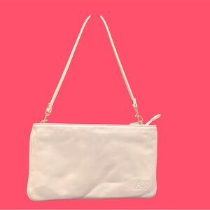 This stylish Anne Klein wristlet clutch is a perfect accessory for women. NEW!